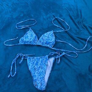 Juniors light blue with floral design bikini suit